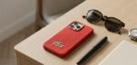 Lacoste-Red-Woven-Logo-Case-iPhone-14-15-Pro-Max-Live-Stores-Retail
